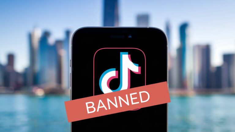 An image of a phone with the TikTok logo and banned banner across the phone.